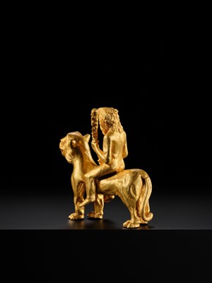 Lot 255 - AN EXCEEDINGLY RARE GOLD FIGURE OF HERCULES RIDING A LION, CENTRAL ASIA, PROBABLY BACTRIAN, CIRCA 1ST-2ND CENTURY AD