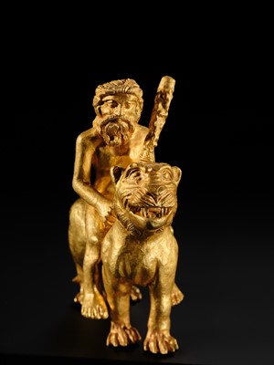 Lot 255 - AN EXCEEDINGLY RARE GOLD FIGURE OF HERCULES RIDING A LION, CENTRAL ASIA, PROBABLY BACTRIAN, CIRCA 1ST-2ND CENTURY AD