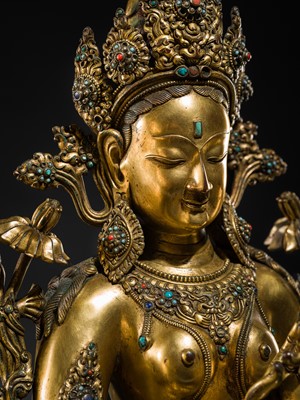 Lot 20 - A VERY LARGE AND EXCEPTIONALLY RARE GILT-BRONZE FIGURE OF GREEN TARA, TIBET, CIRCA 16TH-18TH CENTURY