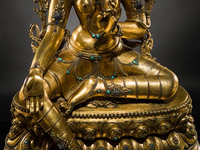 Lot 20 - A VERY LARGE AND EXCEPTIONALLY RARE GILT-BRONZE FIGURE OF GREEN TARA, TIBET, CIRCA 16TH-18TH CENTURY