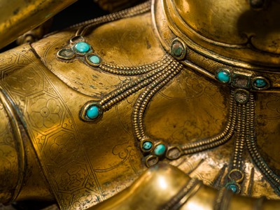 Lot 20 - A VERY LARGE AND EXCEPTIONALLY RARE GILT-BRONZE FIGURE OF GREEN TARA, TIBET, CIRCA 16TH-18TH CENTURY