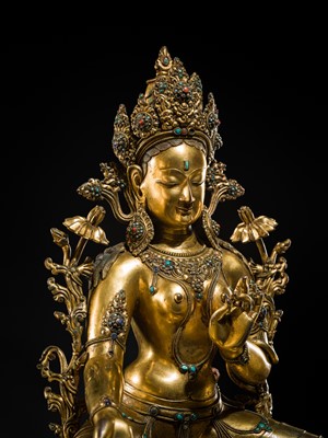 Lot 20 - A VERY LARGE AND EXCEPTIONALLY RARE GILT-BRONZE FIGURE OF GREEN TARA, TIBET, CIRCA 16TH-18TH CENTURY