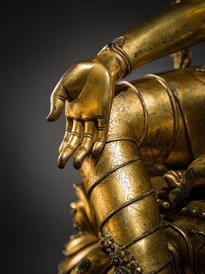 Lot 20 - A VERY LARGE AND EXCEPTIONALLY RARE GILT-BRONZE FIGURE OF GREEN TARA, TIBET, CIRCA 16TH-18TH CENTURY