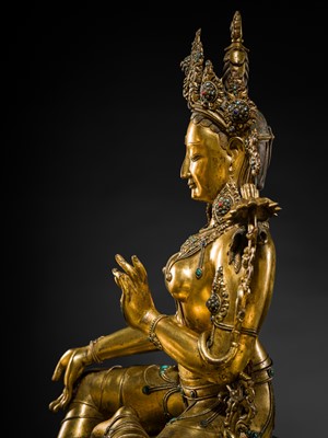 Lot 20 - A VERY LARGE AND EXCEPTIONALLY RARE GILT-BRONZE FIGURE OF GREEN TARA, TIBET, CIRCA 16TH-18TH CENTURY