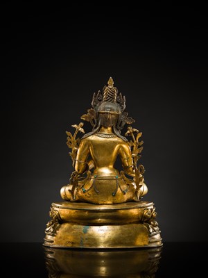 Lot 20 - A VERY LARGE AND EXCEPTIONALLY RARE GILT-BRONZE FIGURE OF GREEN TARA, TIBET, CIRCA 16TH-18TH CENTURY