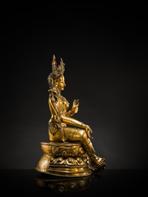 Lot 20 - A VERY LARGE AND EXCEPTIONALLY RARE GILT-BRONZE FIGURE OF GREEN TARA, TIBET, CIRCA 16TH-18TH CENTURY