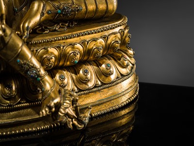 Lot 20 - A VERY LARGE AND EXCEPTIONALLY RARE GILT-BRONZE FIGURE OF GREEN TARA, TIBET, CIRCA 16TH-18TH CENTURY
