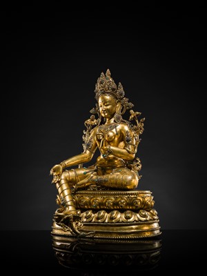 Lot 20 - A VERY LARGE AND EXCEPTIONALLY RARE GILT-BRONZE FIGURE OF GREEN TARA, TIBET, CIRCA 16TH-18TH CENTURY