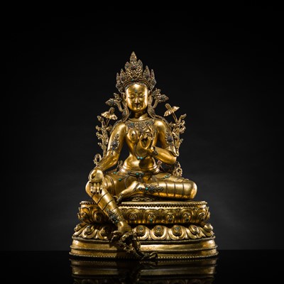 Lot 20 - A VERY LARGE AND EXCEPTIONALLY RARE GILT-BRONZE FIGURE OF GREEN TARA, TIBET, CIRCA 16TH-18TH CENTURY