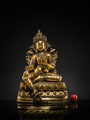Lot 20 - A VERY LARGE AND EXCEPTIONALLY RARE GILT-BRONZE FIGURE OF GREEN TARA, TIBET, CIRCA 16TH-18TH CENTURY