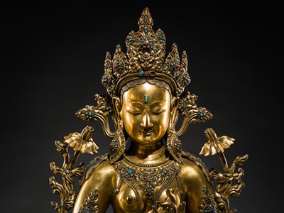Lot 20 - A VERY LARGE AND EXCEPTIONALLY RARE GILT-BRONZE FIGURE OF GREEN TARA, TIBET, CIRCA 16TH-18TH CENTURY