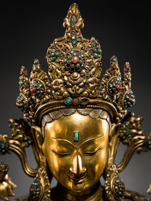 Lot 20 - A VERY LARGE AND EXCEPTIONALLY RARE GILT-BRONZE FIGURE OF GREEN TARA, TIBET, CIRCA 16TH-18TH CENTURY