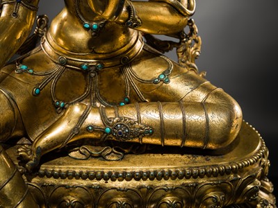 Lot 20 - A VERY LARGE AND EXCEPTIONALLY RARE GILT-BRONZE FIGURE OF GREEN TARA, TIBET, CIRCA 16TH-18TH CENTURY