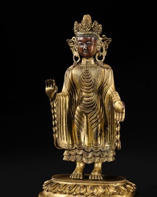 Lot 129 - A RARE UDAYANA-STYLE GILT-BRONZE FIGURE OF GAUTAMA BUDDHA, QING DYNASTY, 18TH CENTURY