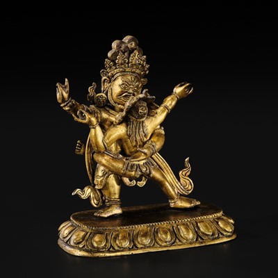 Lot 65 - A SMALL GILT-BRONZE FIGURE OF VAJRAPANI AND CONSORT, 18TH-19TH CENTURY