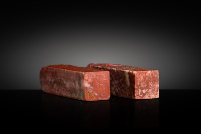A FINE PAIR OF ‘CHICKEN BLOOD’ SOAPSTONE SEALS BY HE TANG, DATED 1879