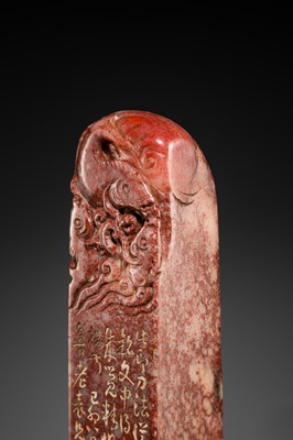 A FINE PAIR OF ‘CHICKEN BLOOD’ SOAPSTONE SEALS BY HE TANG, DATED 1879