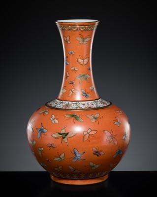 Lot 261 - AN UNUSUAL ORANGE-GROUND FAMILLE ROSE 'BUTTERFLY' BOTTLE VASE