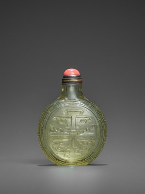 Lot 374 - A TRANSPARENT OLIVE-GREEN GLASS ‘TAOTIE’ SNUFF BOTTLE, QING DYNASTY