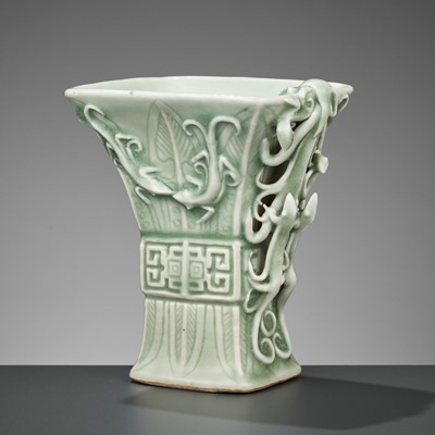 Lot 244 - A PALE CELADON-GLAZED ARCHAISTIC ‘LIBATION’ CUP, QIANLONG PERIOD