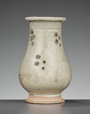 A SMALL IRON-SPOTTED QINGBAI HU VASE, SONG TO YUAN DYNASTY