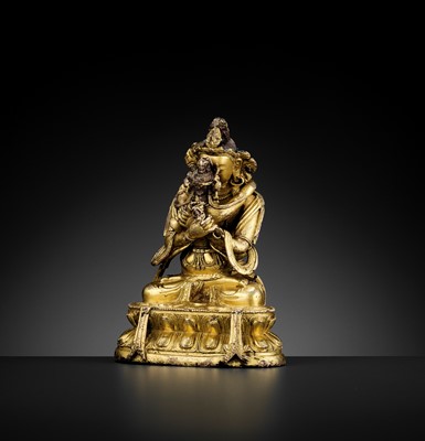 Lot 482 - A GILT BRONZE FIGURE OF VAJRADHARA AND CONSORT, EARLY QING