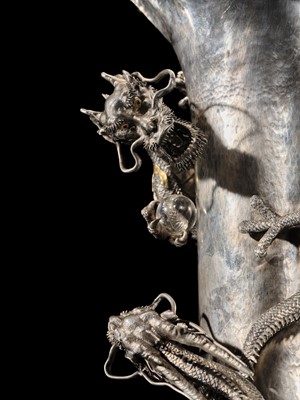 Lot 22 - WATANABE: AN IMPRESSIVE AND VERY LARGE (53 CM) SILVER ‘DRAGONS WITH CRYSTAL TAMA’ VASE