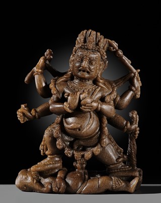 Lot 47 - A FINELY CARVED SOAPSTONE FIGURE OF SHADBHUJA MAHAKALA, TIBET, 13TH-14TH CENTURY, EX ULRICH VON SCHROEDER