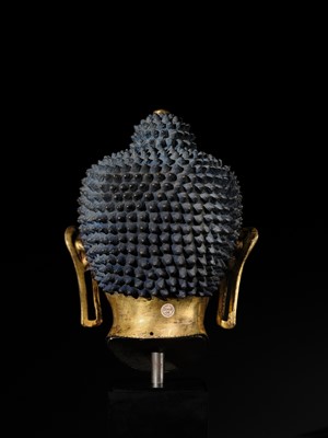 Lot 36 - THE MONUMENTAL AND UNIQUE ‘ULRICH VON SCHROEDER’ GILT-COPPER HEAD OF BUDDHA, TIBET, 14TH CENTURY