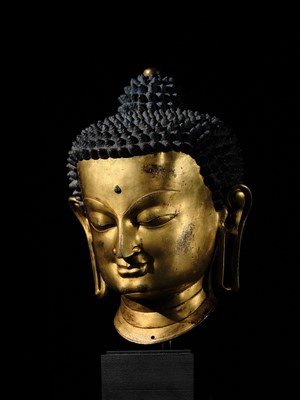 Lot 36 - THE MONUMENTAL AND UNIQUE ‘ULRICH VON SCHROEDER’ GILT-COPPER HEAD OF BUDDHA, TIBET, 14TH CENTURY