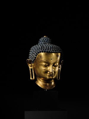Lot 36 - THE MONUMENTAL AND UNIQUE ‘ULRICH VON SCHROEDER’ GILT-COPPER HEAD OF BUDDHA, TIBET, 14TH CENTURY
