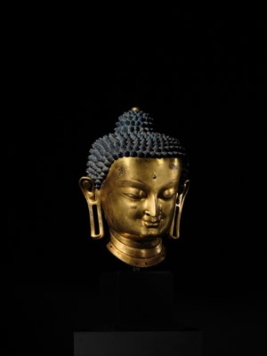 Lot 36 - THE MONUMENTAL AND UNIQUE ‘ULRICH VON SCHROEDER’ GILT-COPPER HEAD OF BUDDHA, TIBET, 14TH CENTURY