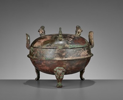 Lot 410 - AN ARCHAIC BRONZE RITUAL TRIPOD VESSEL AND COVER, DING, WARRING STATES