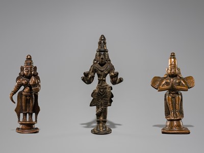 A LOT WITH THREE BRONZE FIGURES OF SRI DEVI, KALI AND GARUDA, 18TH-19TH CENTURY