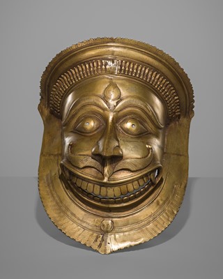 Lot 1439 - A LARGE BRONZE BHUTA RITUAL MASK OF SHIVA, TULU NADU REGION, 19TH CENTURY