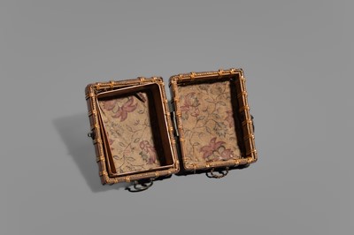 Lot 1559 - A GROUP OF TWO LEATHER AND RATTAN TABAKO-IRE (POUCHES)