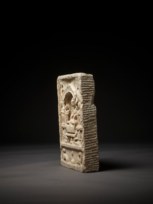 Lot 491 - AN IMPORTANT WHITE MARBLE STELE OF BUDDHA, MAUDGALYAYANA AND SARIPUTRA, NORTHERN QI