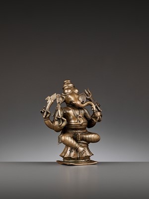 Lot 747 - AN INDIAN BRONZE FIGURE OF GANESHA, 17TH-18TH CENTURY