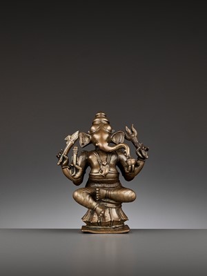 Lot 747 - AN INDIAN BRONZE FIGURE OF GANESHA, 17TH-18TH CENTURY