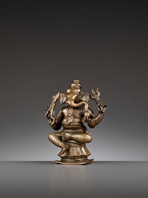 Lot 747 - AN INDIAN BRONZE FIGURE OF GANESHA, 17TH-18TH CENTURY
