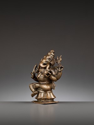 Lot 747 - AN INDIAN BRONZE FIGURE OF GANESHA, 17TH-18TH CENTURY