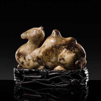 Lot 216 - A GRAY AND BLACK JADE FIGURE OF A RECUMBENT CAMEL, MING DYNASTY OR EALIER