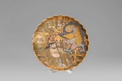 Lot 1572 - A SATSUMA EARTHENWARE SCALLOPED DISH WITH ARHATS