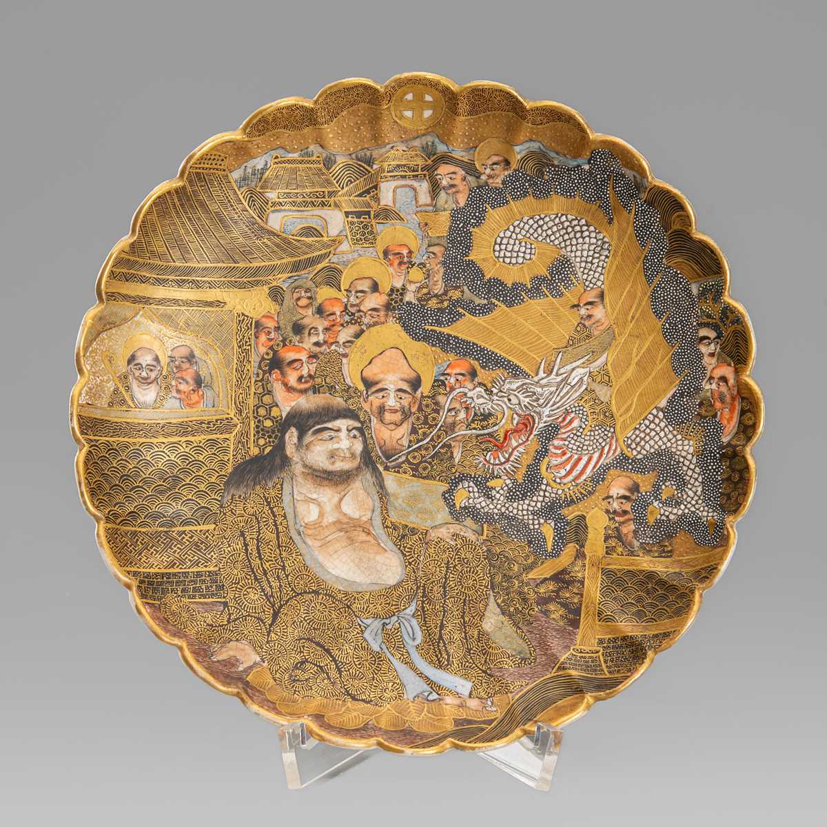 Lot 1572 - A SATSUMA EARTHENWARE SCALLOPED DISH WITH ARHATS