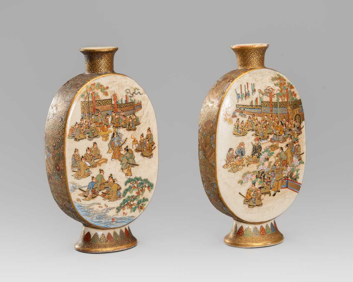 Lot 1569 - A PAIR OF SATSUMA EARTHENWARE MINIATURE VASES