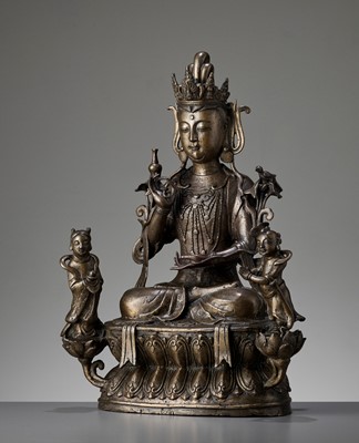 Lot 470 - A LARGE AND MASSIVE BRONZE TRIAD OF AVALOKITESHVARA AND TWO ACOLYTES, MING TO EARLY QING