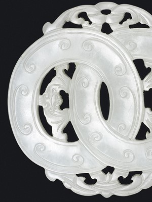 Lot 98 - A WHITE JADE OPENWORK ‘LINKED RINGS’ PLAQUE, QING DYNASTY