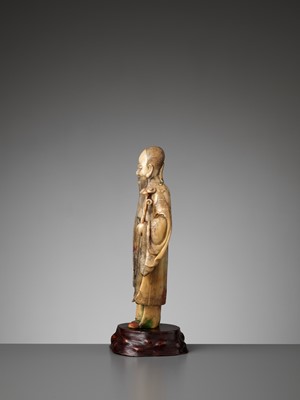 Lot 38 - A CARVED SOAPSTONE FIGURE OF SHOULAO, MID-QING