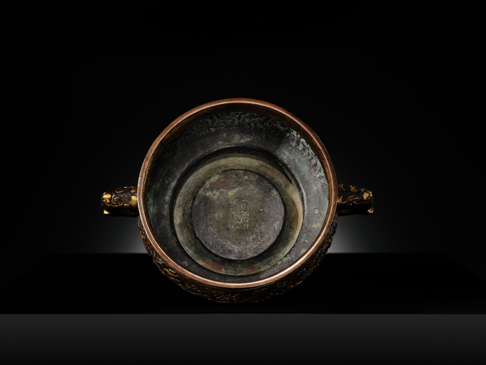 Lot 103 - A HU WENMING PARCEL-GILT BRONZE ‘TEN