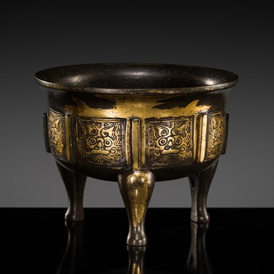 Lot 151 - A PARCEL-GILT BRONZE TRIPOD CENSER, 17TH-18TH CENTURY